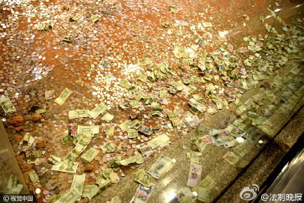 杭州雷峰塔不堪硬币之累 日积月累价值令人惊叹【图】
