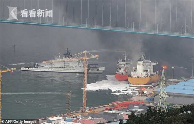 韩国港口油轮爆炸起火 桥上汽车狂逃如大片 游轮爆炸动图组图